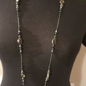 Beautiful colors beads and stones necklace very long and the stones are beautifu